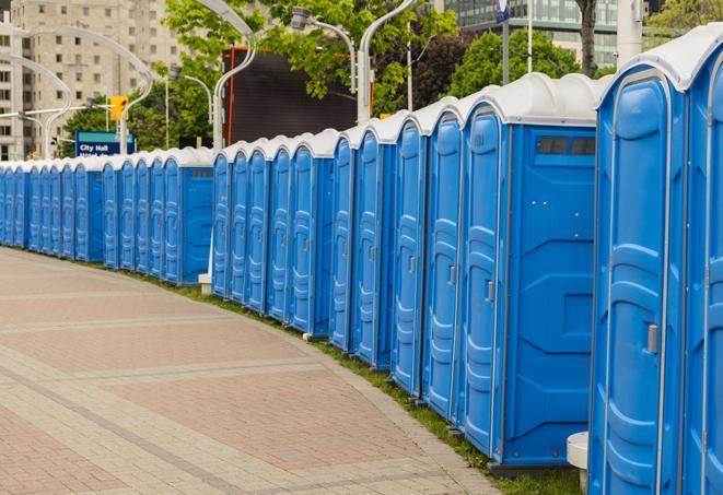 a row of portable restrooms at a trade show, catering to visitors with a professional and comfortable experience in Granada Hills, CA